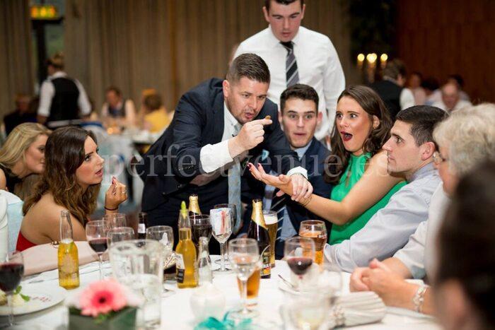 guests-surprised-by-the-magician's-tricks-photo-by-tumago